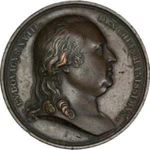 Buste de Louis XVI à droite.