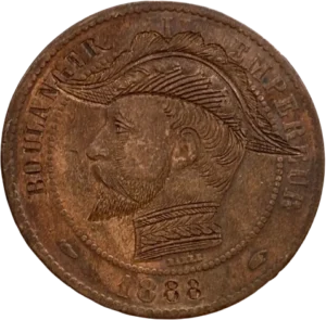 La tête Napoléon III est remplacée par le portrait du général Boulanger, barbu et coiffé d’un bicorne.