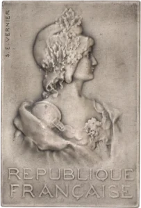 inscription devant un rameau d'olivier.