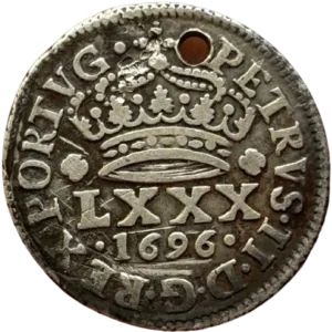 croix accostée de quatre P et entouré d'une légende circulaire.