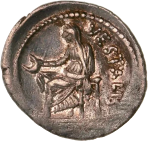 Tête de Flore à droite, coiffée d’une couronne de fleurs. Derrière, un lys.