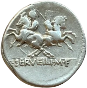 Les Dioscures, Castor et Pollux, à cheval, se séparant de chaque côté, cuirassés avec le manteau flottant sur l'épaule, coiffés d'un bonnet surmonté d'une étoile, et tiennent chacun une javeline transversale.