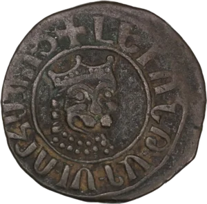 Tête de lion vue de trois quarts à droite et ornée d’un diadème à trois fleurons.