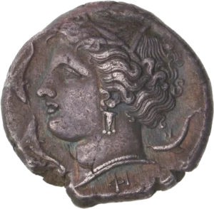 Tête d'Aréthuse à gauche, entourée de dauphins.