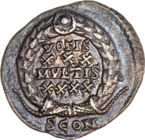 inscription dans un couronne végétale.