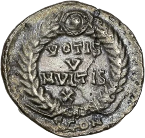 inscription dans une couronne végétale.