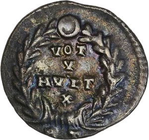 inscription latine dans une couronne végétale.