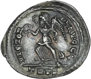 Victoria allanr à gauche en tenant une couronne de laurier.