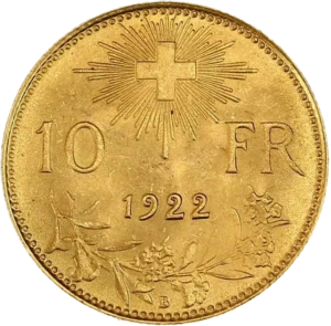 Croix suisse rayonnante au dessus d'une branche.