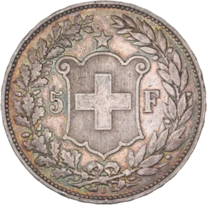 Écu surmonté d'une étoile dans une couronne formée d'une branche de chêne et d'une branche d'olivier.