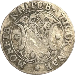 "Pro deo et patria" en 4 lignes dans un champs blasonné et entouré de différents végétaux.