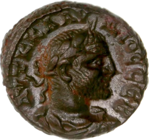 Buste lauré, drapé et cuirassé de Claude II à droite.