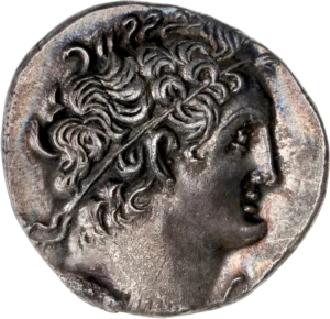 Tête laurée de Ptolémé VIII à droite.