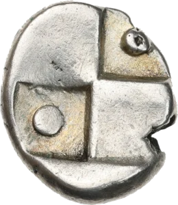 Carré creux quadripartite avec deux sections en creux et deux sections en relief, orné de globules.