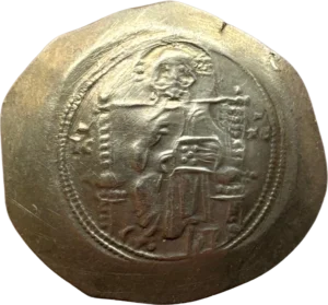 Le Christ trônant de face tenant les Évangiles.